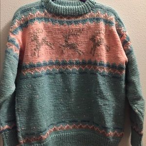 Handmade sweater with reindeer.